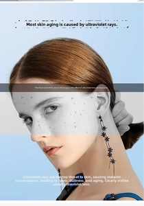 Detail of vintage black floral drop earrings with long tassels on a female model