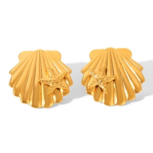 Macro view of gold seashell earrings with starfish detail in polished 18k gold plating