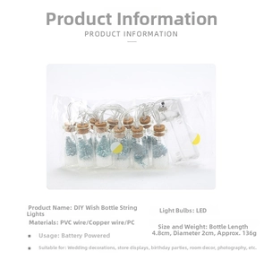 Detailed view of LED wishing bottle string light with miniature Christmas tree and snow