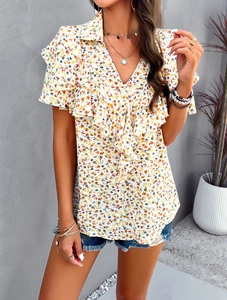 Detailed view of women's V-neck floral t-shirt with ruffle sleeves and elegant prints