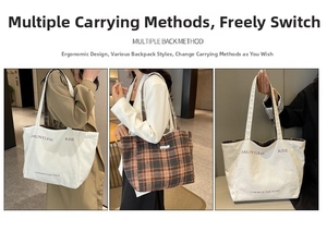 Detail of a large double-sided canvas tote bag with lettering and plaid patterns