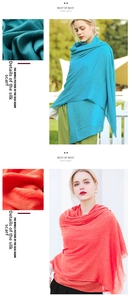 Detail of teal and coral cotton linen scarves with pleated texture and fine fringe trim
