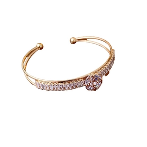 Rose gold adjustable camellia cuff bracelet with cubic zirconia paving in main product view