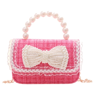 Pink tweed girls handbag with pearl handle, bow decoration and gold metal chain strap