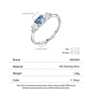 Elegant S925 sterling silver geometric ring featuring blue crystal and opal accents