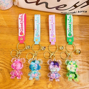 Cartoon glitter liquid bear keychains in four colors with silicone wrist straps and bells