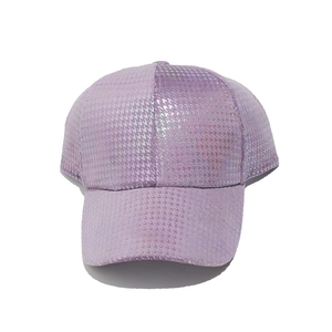 Close-up of holographic purple baseball cap featuring a shiny houndstooth pattern texture