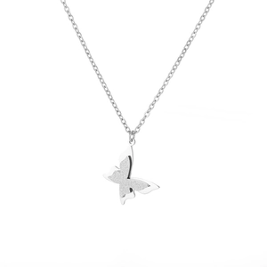 Detailed view of silver butterfly pendant with frosted wings and polished finish details