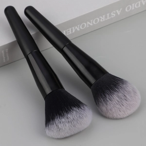 Dual piece black flame-shaped makeup brush set for soft powder and blush application