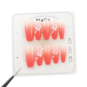 Pink gradient coffin press-on nails with 3D butterflies and rhinestones on white display card