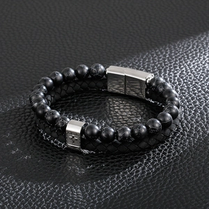 Close-up of black beaded leather bracelet with stainless steel cross magnetic clasp