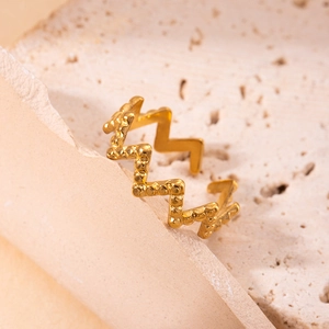 Minimalist gold titanium ring with hammered texture and wavy adjustable design