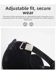 Detail of adjustable metal buckle and vintage washed denim texture on black baseball cap