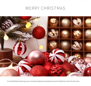Detailed close-up of matte pink and red glitter Christmas ornaments with golden caps