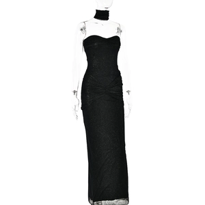Detail of elegant black strapless evening dress with waist pleats and matching choker