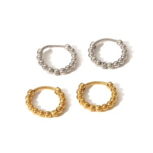 French vintage 18K gold and silver stainless steel beaded hoop earrings on white background