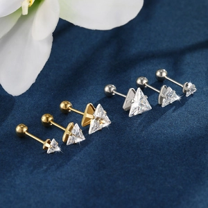 Detailed view of triangle CZ stud earrings with screw ball backs in gold and silver steel