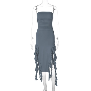 Detail of the gray blue bodycon dress with side ruffles and pleated design features