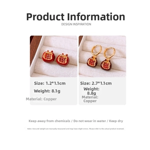 Detailed view of 18K gold plated copper pomegranate earrings with size and weight specs
