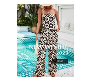 Detail of bohemian two-piece set featuring sun pattern print and wide-leg trousers