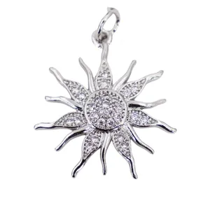Macro detail of sunburst pendant with micro-paved cubic zirconia in a silver finish