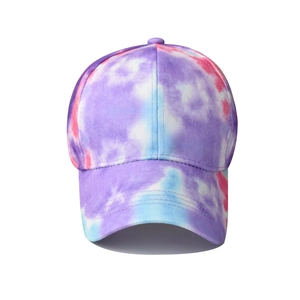 Close-up of artistic tie-dye pattern on cotton visor with purple and blue hues