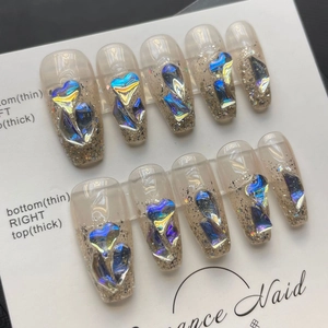 Handmade aurora glitter press-on nails in long coffin shape with sheer nude base