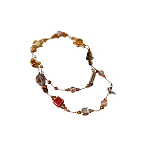 Minimalist brown ceramic geometric layered necklace with golden butterfly pendant on white