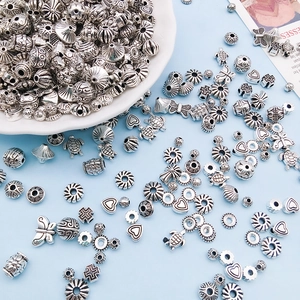 Mixed set of vintage silver alloy DIY beads featuring heart, turtle and floral designs