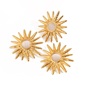 Golden sunburst earrings with cat eye stones and hammered texture on white background