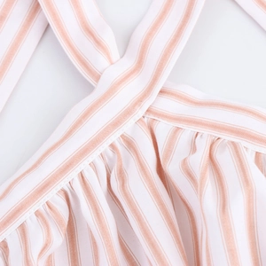 Pink and white striped halter maxi dress with cross strap design and pleated details