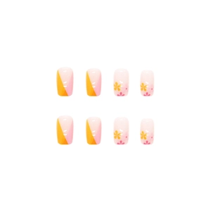 Square orange and pink press-on nails with cute floral patterns and geometric blocks
