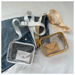 Detail of transparent PVC jelly bags with wide nylon straps and leather envelope pouches