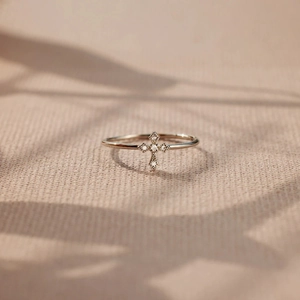 Minimalist S925 sterling silver cross ring with sparkling zircon in a gold finish