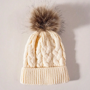 Winter cable knit beanie for kids with large faux fur pom-pom in cream white
