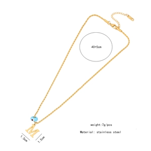 Detailed specs of the gold M-letter necklace with evil eye charm and stainless steel size info