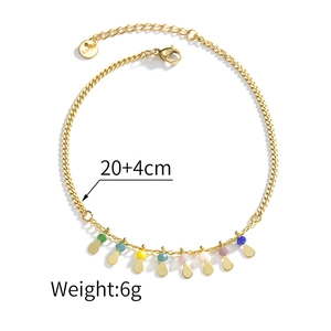 Detail of gold 304 stainless steel anklet with colorful beads and lobster clasp closure