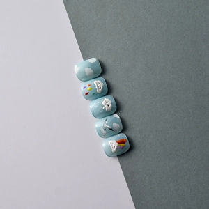 5D embossed nail stickers featuring blue sky, white clouds, and rainbow 3D nail art design