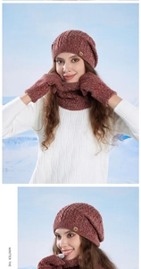 Close-up of knit winter set with thick cable texture including hat, scarf and gloves