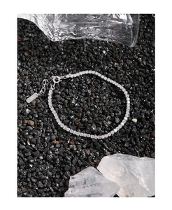 Detailed shot of an S925 sterling silver tennis bracelet with round white zircons