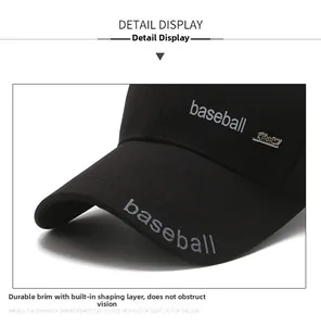 Detailed close-up of a black cotton baseball cap with sport metal logo and baseball embroidery