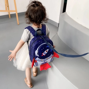 Toddler rocket backpack in navy blue with space astronaut pattern and safety leash