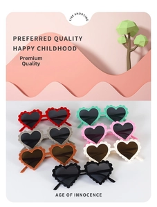 Detailed view of heart-shaped kids sunglasses in seven colors with wavy frame design