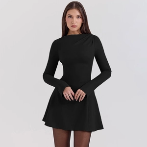 Detail of the high collar and pleated texture on this black slim fit long sleeve mini dress