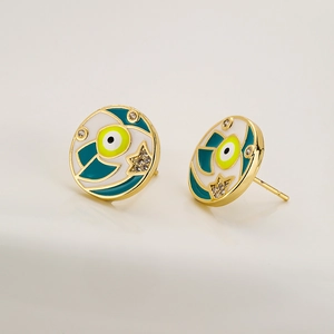 Golden eye stud earrings with green enamel and sparkling star zircon accents