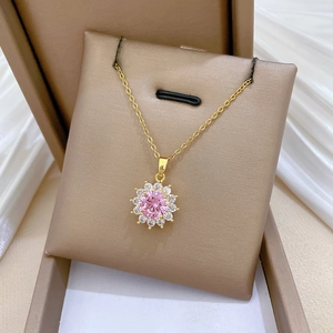 Elegant gold titanium steel necklace with pink gemstone and crystal sunflower pendant