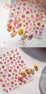 Detail of 5D embossed strawberry nail art stickers with sweet red fruit and heart patterns