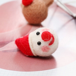 Handmade wool felt Santa Claus and reindeer hanging ornaments for Christmas home decor
