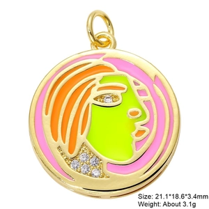 Abstract face pendant detail in gold finish with colorful enamel and zircon inlay