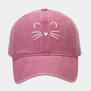 Detailed embroidery of cat whiskers and heart nose on pink washed cotton baseball cap